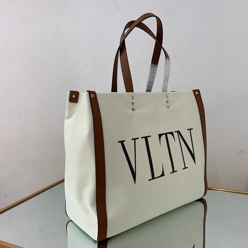 入手困難ヴァレンティノ トートバッグ 偽物 ショッピングバッグ NEON VLTN キャンバス ミディアム Vui76345