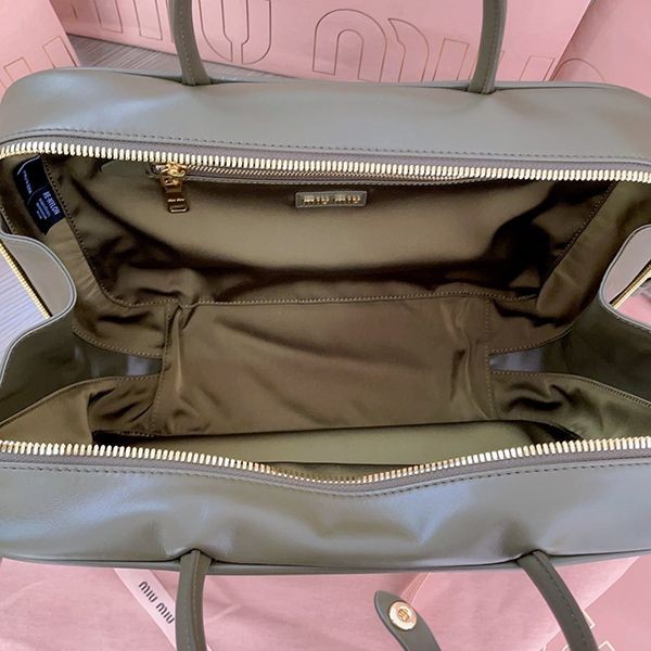 完売必至 ミュウミュウ レザーハンドバッグ 偽物 コニャック myw63192