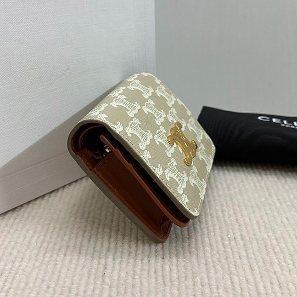 送料込 セリーヌ トリオンフキャンバスコンパクトウォレット 偽物 10K622CQH