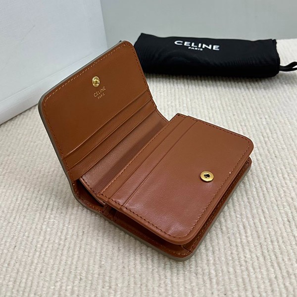 送料込 セリーヌ トリオンフキャンバスコンパクトウォレット 偽物 10K622CQH