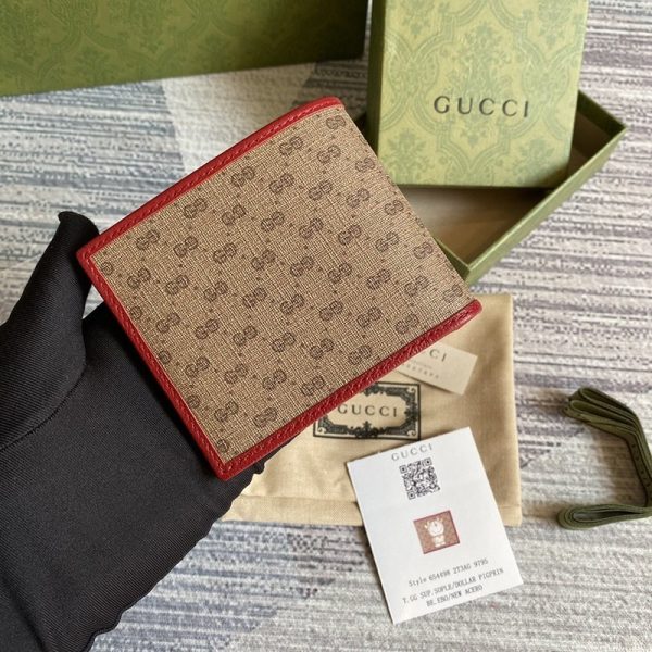 大人気コラボ商品 グッチ ドラえもん 偽物 二つ折り財布 牛柄 6544982T3AG 9795 - 画像 (2)