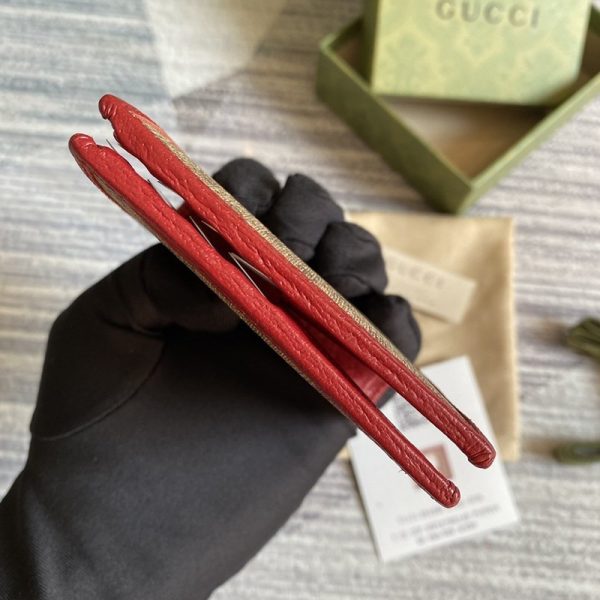 大人気コラボ商品 グッチ ドラえもん 偽物 二つ折り財布 牛柄 6544982T3AG 9795 - 画像 (5)